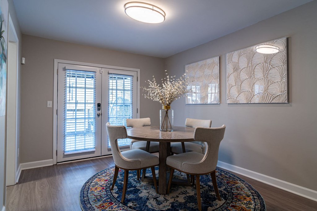 Dining room table and chairs at Elme Sandy Springs Apartments, Atlanta, GA