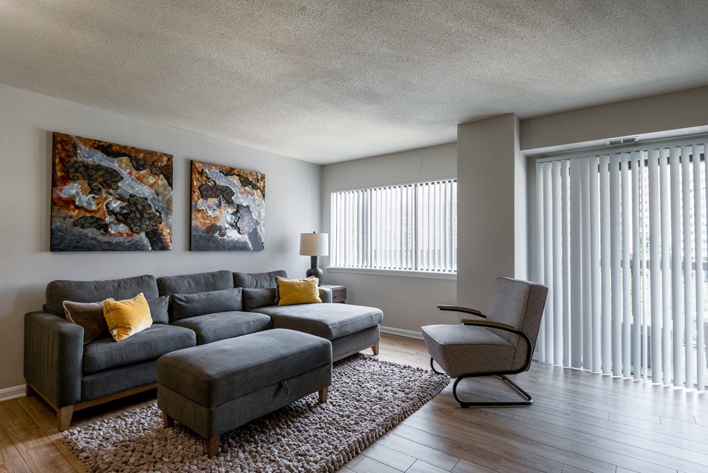 a living room with a couch and a chair