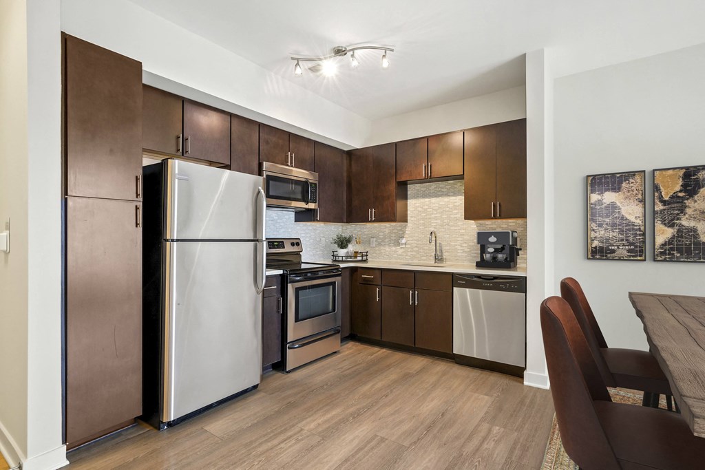 Kitchen with stainless steel appliances at The Maxwell Apartments, Virginia, 22203
