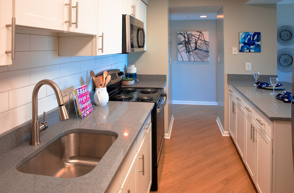 kitchen with stainless steel appliances and white cabinets  at Cascade at Landmark, Alexandria, 22304