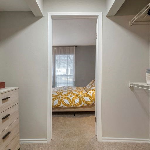 a bedroom with a bed and a closet at Elme Alexandria, Virginia, 22304