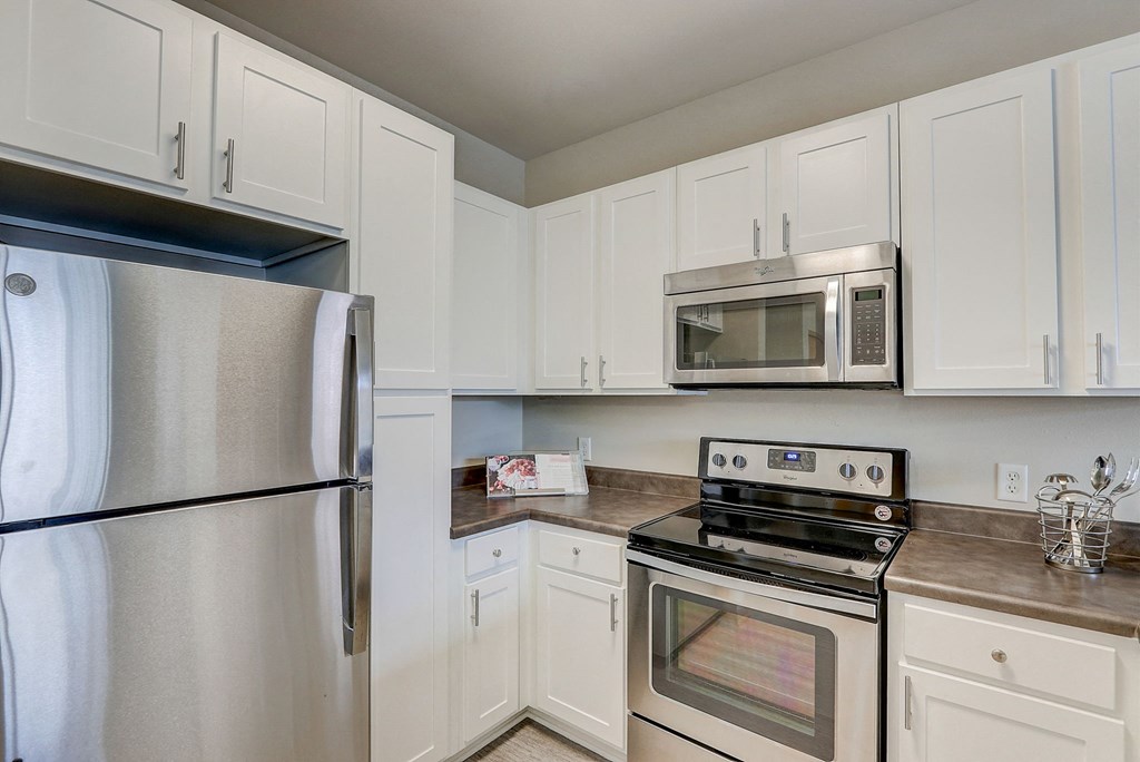a kitchen with a stove and a counter top