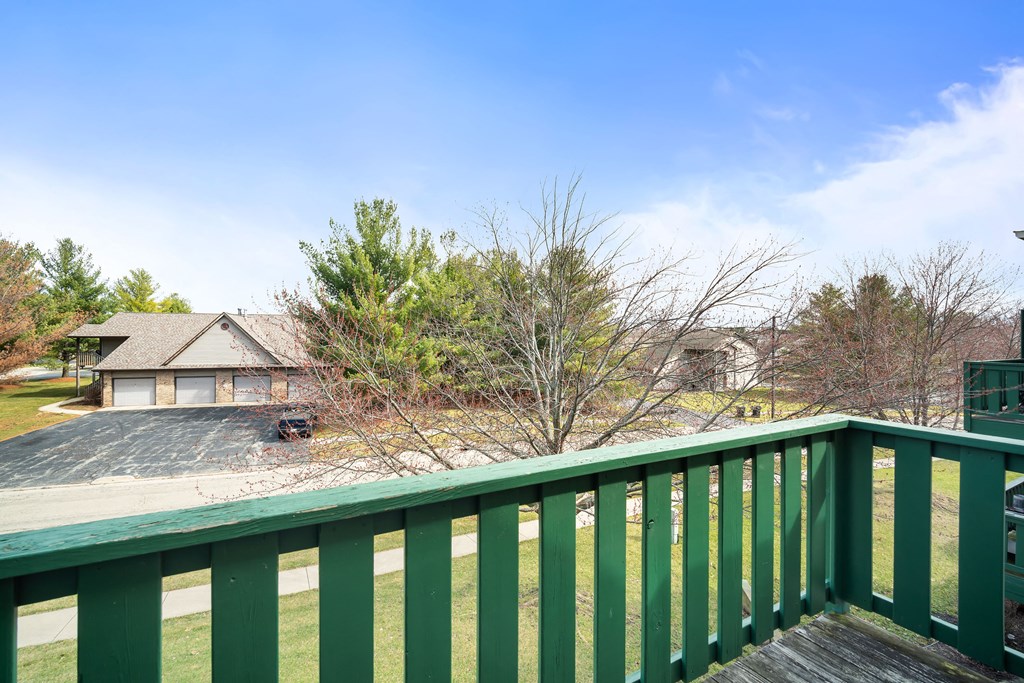 the deck has a view of the neighborhood