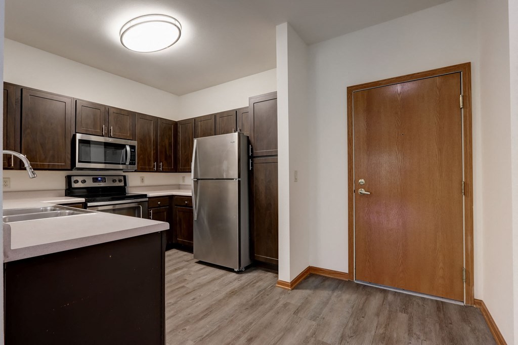 a room with a bar and balloons in it