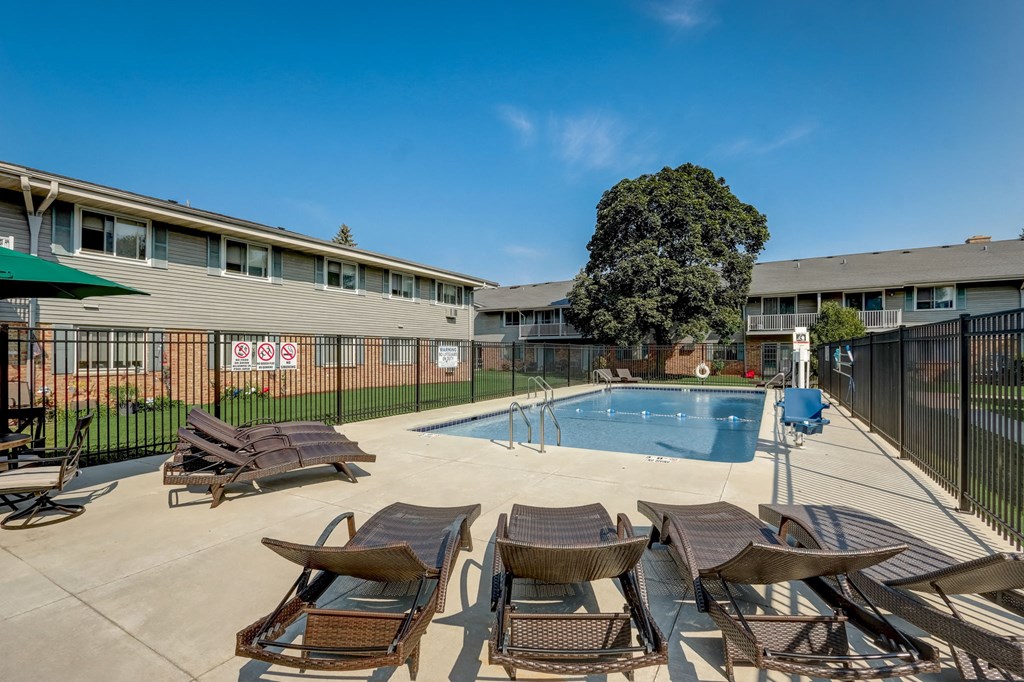 our apartments have a large pool and lounge chairs