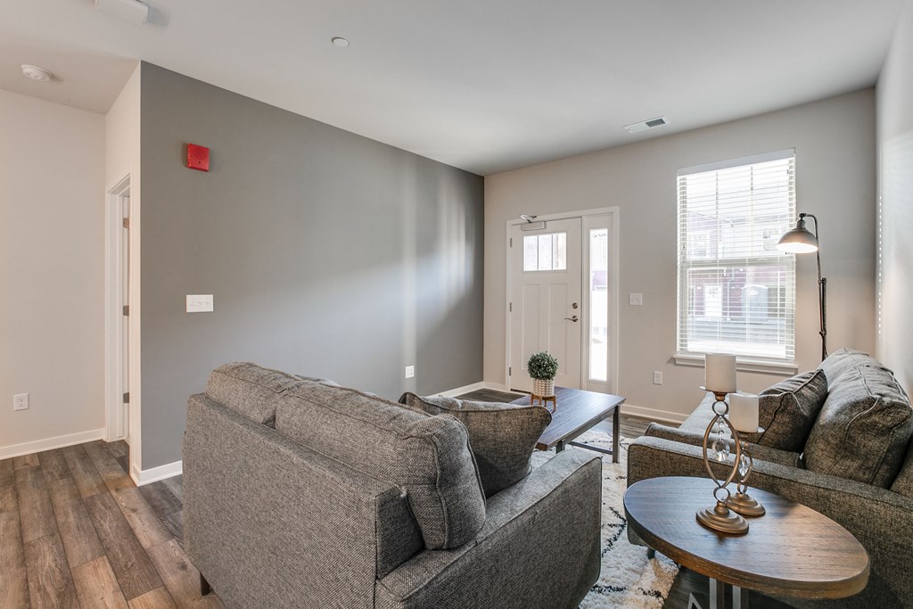 a living room with a couch and a coffee table