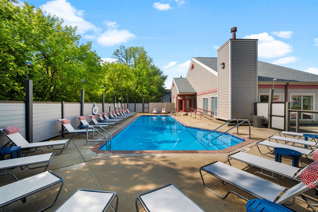 our apartments have a large pool and lounge chairs