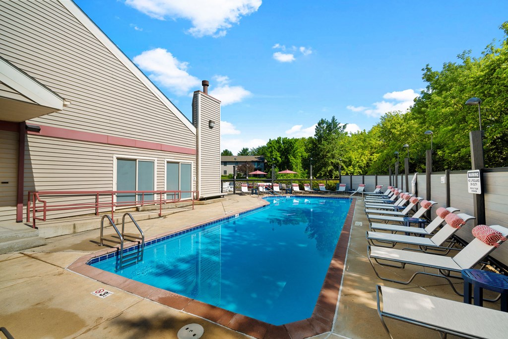 the reserve at city center amenities include a pool and lounge chairs
