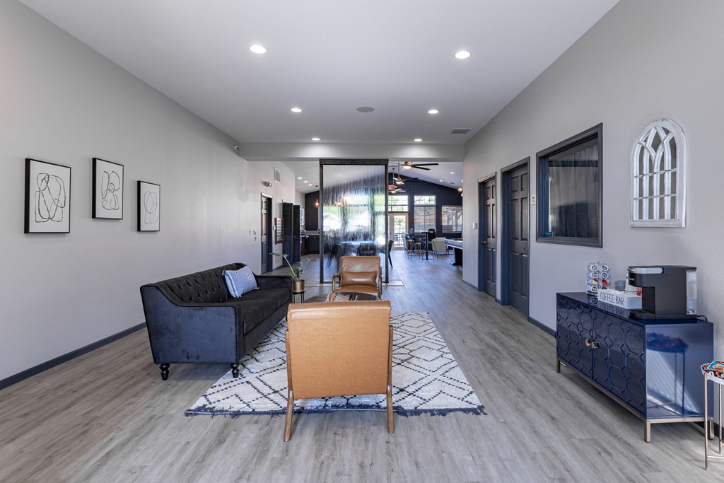 the reserve at bucklin hill leasing office area with couches chairs and coffee table