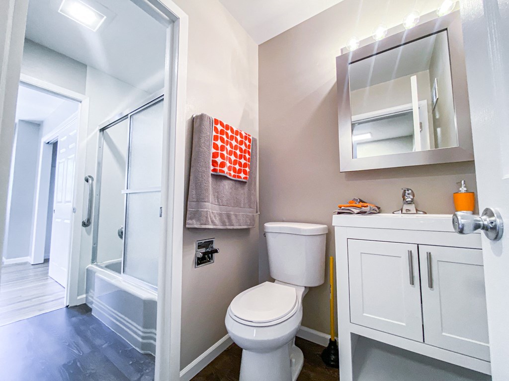 a small bathroom with a toilet and a shower