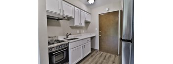 the preserve at ballantyne commons apartment kitchen with stainless steel appliances