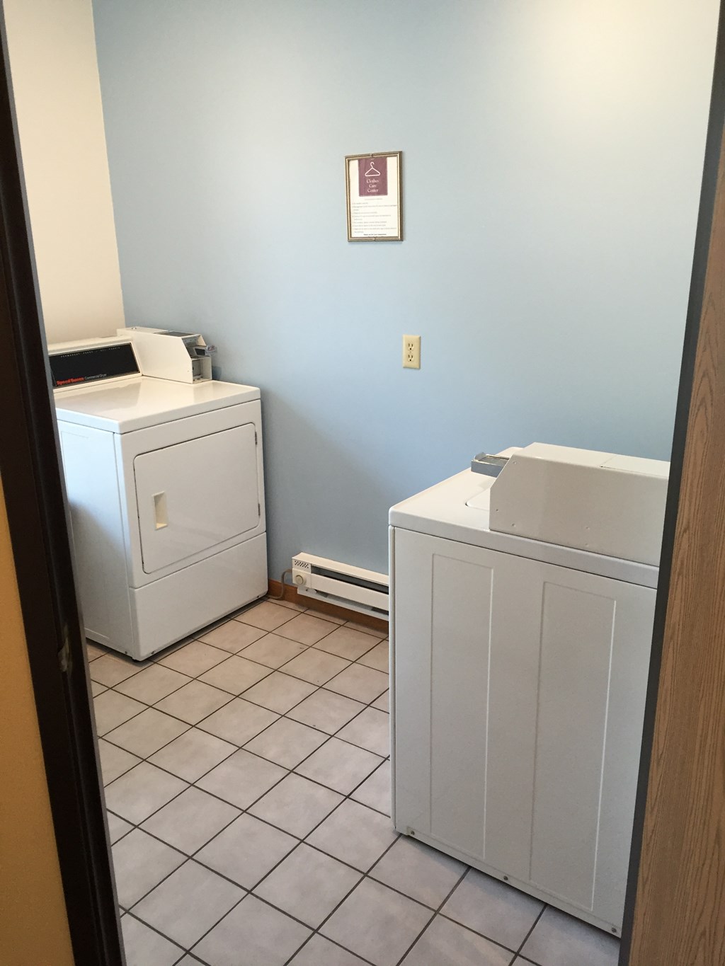 A bathroom with a toilet and a sink.