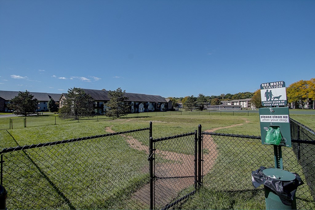 a baseball field in front of a building