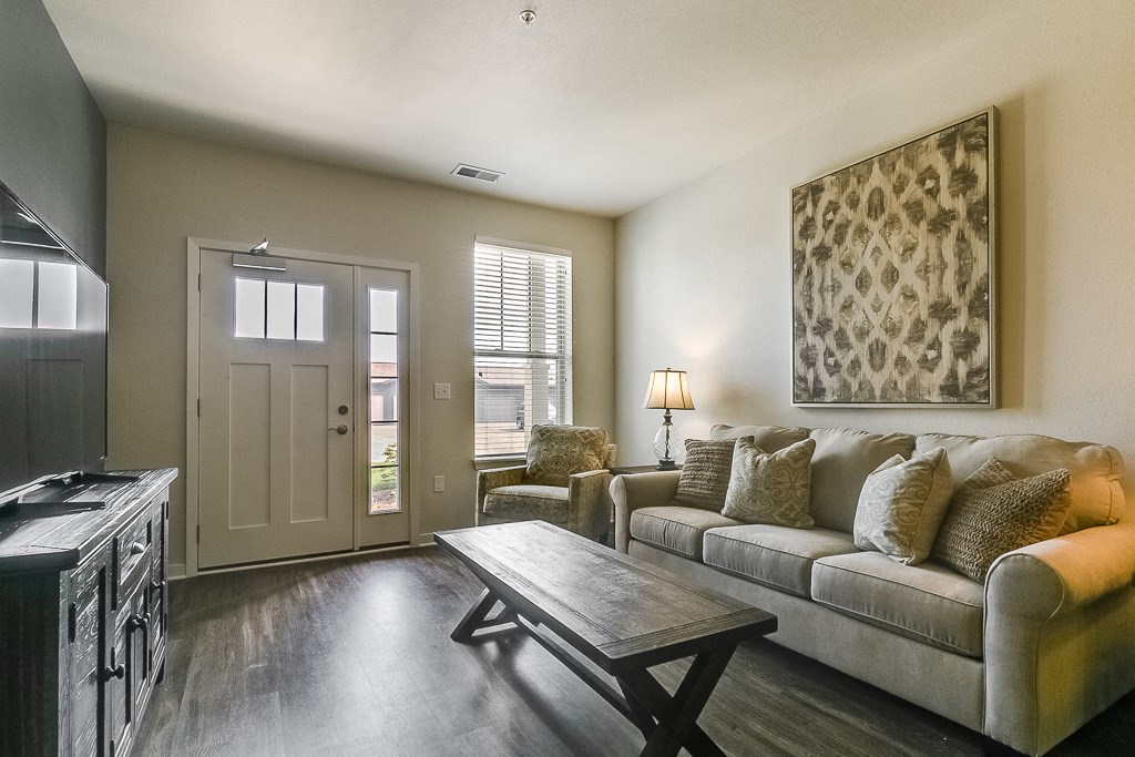 a living room with a couch and a coffee table