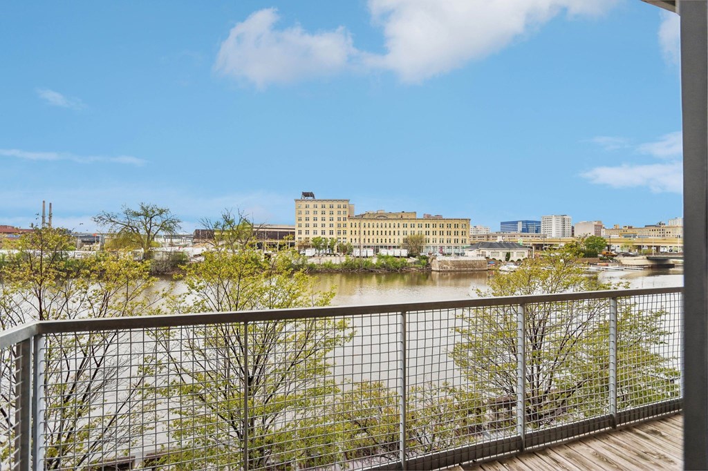 the view of the river and the city from a balcony