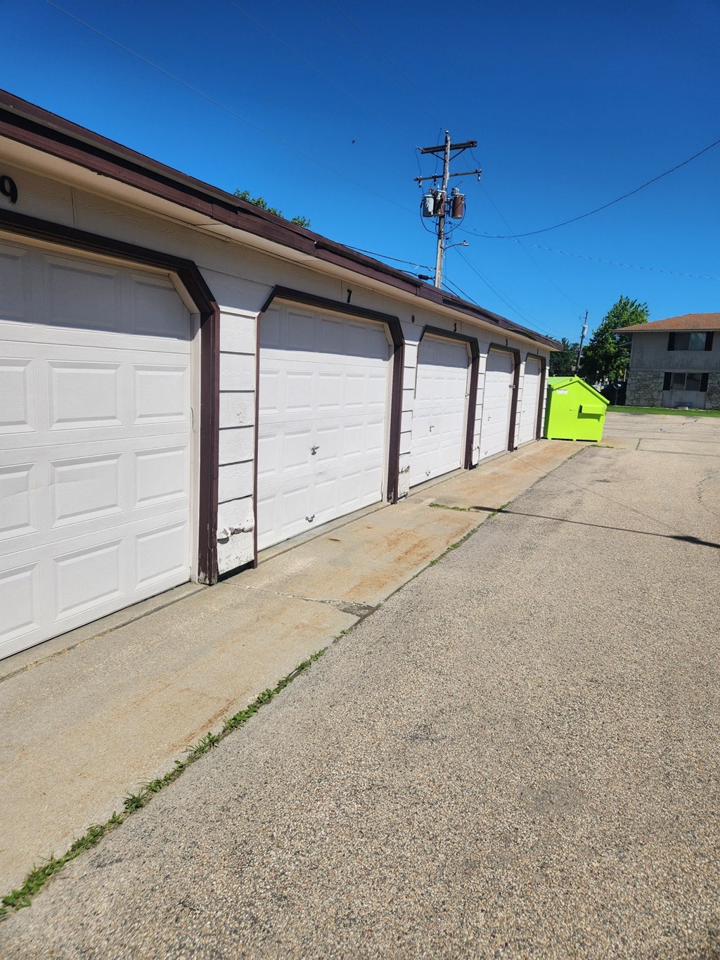 a row of garage doors on the side of a building