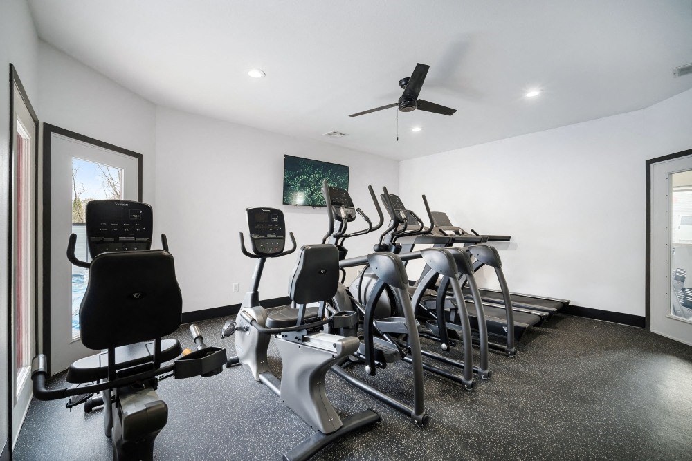 the gym has a slew of treadmills and reformer chairs