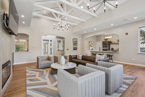 A living room with a grey sofa and a coffee table.