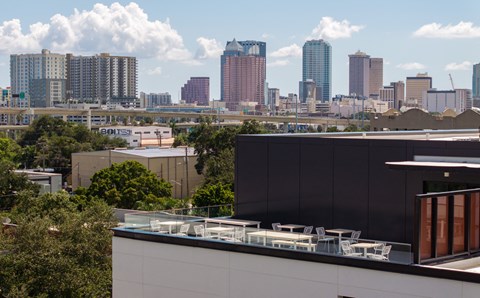 a view of the city skyline from the roof of a building