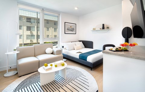 a living room with two couches and a table