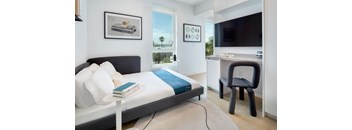 Bedroom With TV at Miles at Harvard, Los Angeles, CA, 90020