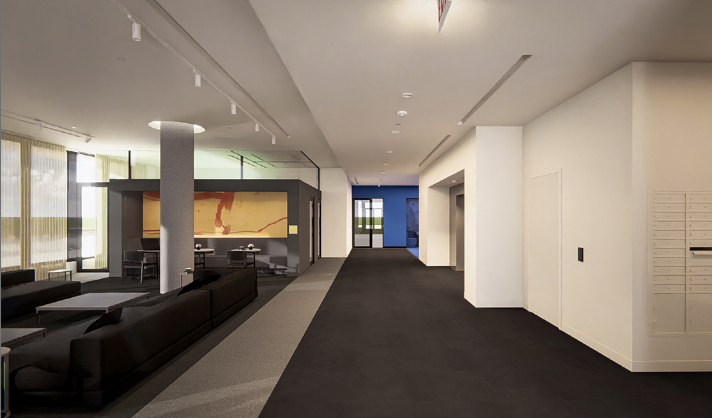 a large room with couches and a large screen on the wall at Miles at Ybor, Florida, 33605