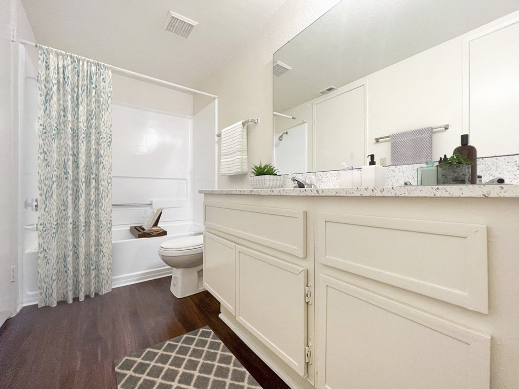 bathroom with toilet and shower at Azul Apartments, Hemet, CA, 92545