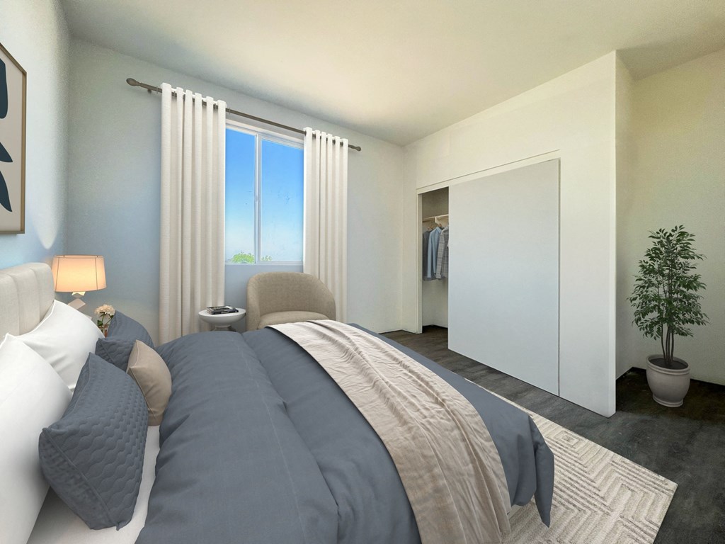 a bedroom with a bed and a closet