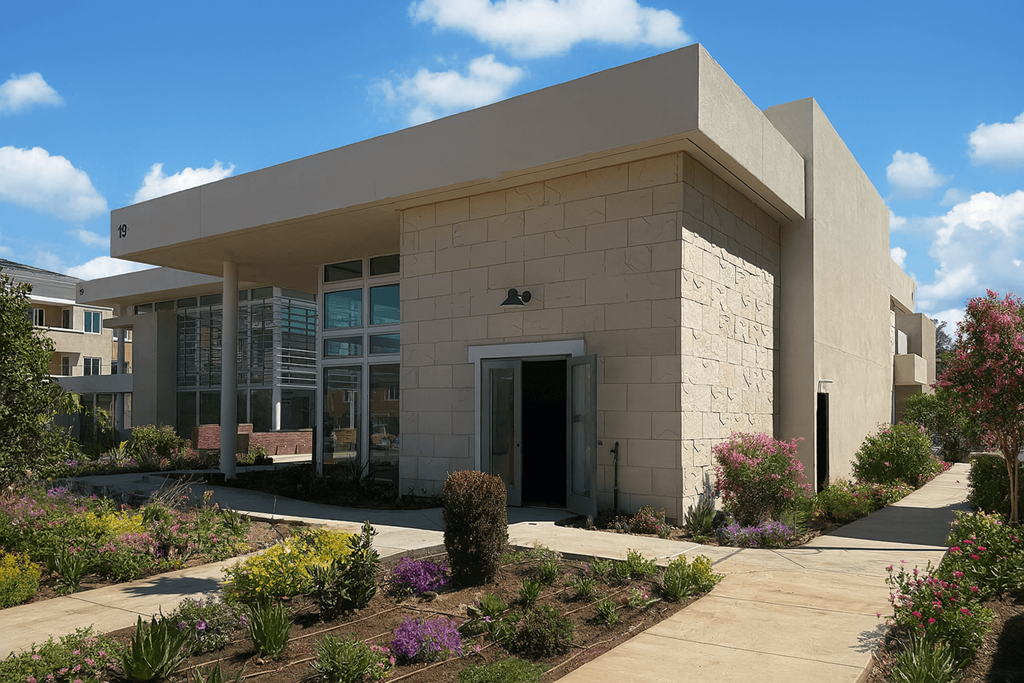 A modern building with a garden in front.at The Park on Washington, California