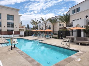 Resort-style pool with lounge chairs