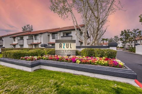 Monument sign with twilight at Azul Apartments, California
