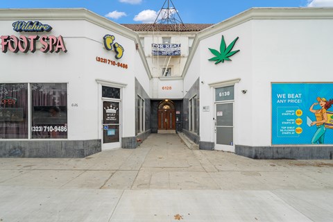The front of a spa with a sign that says "Wilshire Foot Spa".