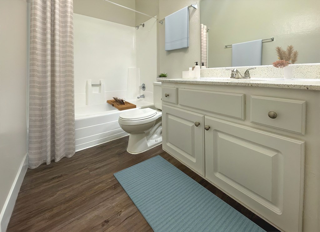 a bathroom with a toilet and a bath tub at Summer Meadows, Riverside, CA, 92507