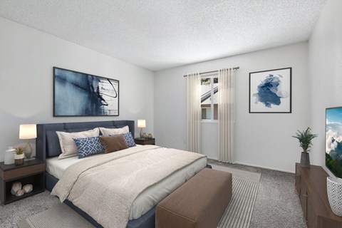 Second Bedroom in Bent Tree 2 Bed 1 Bath apartment home with carpeted flooring and large window allowing for gorgeous natural lighting.