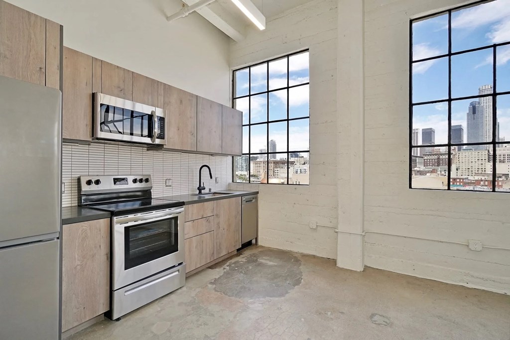 GamerHive Apartments Vacant unit kitchen view with stainless steel appliances