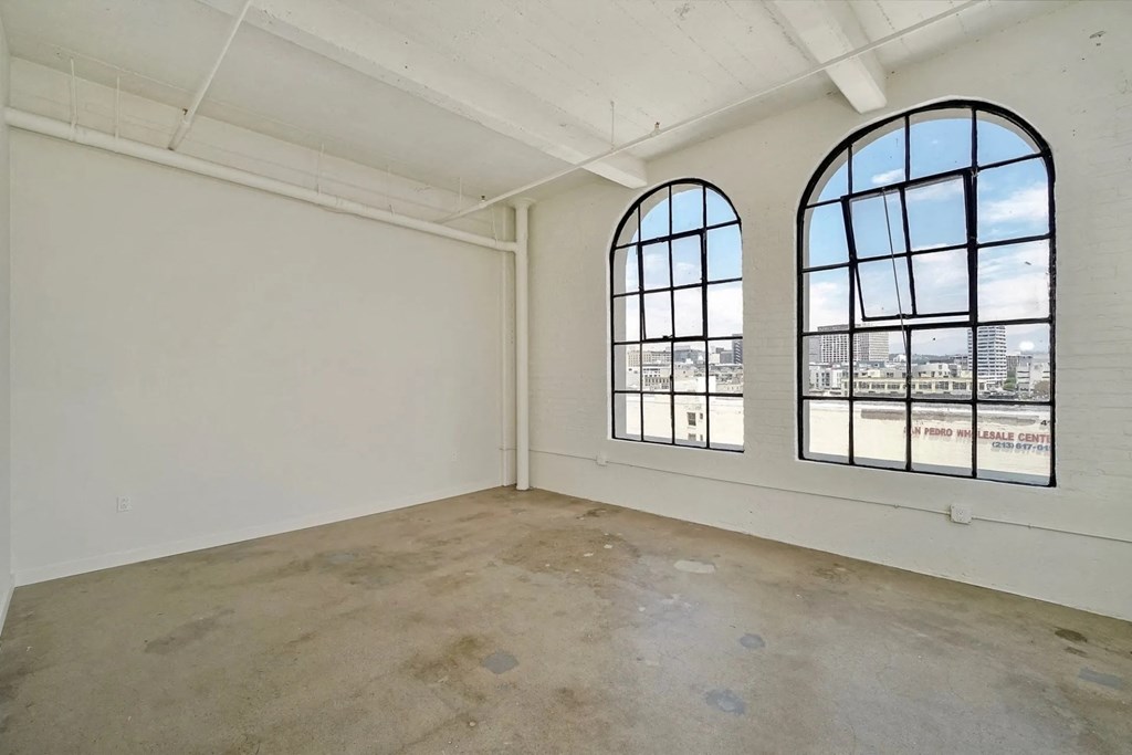 GamerHive Apartments Vacant unit living room view 2