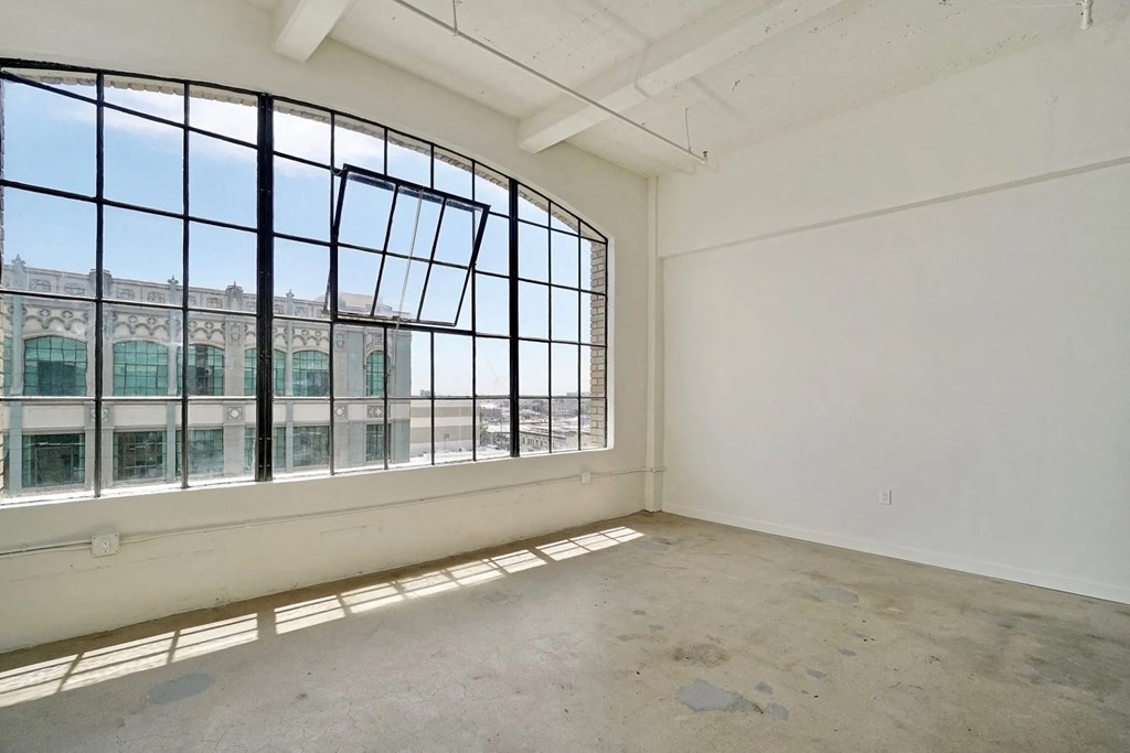 GamerHive Apartments Vacant unit  living room