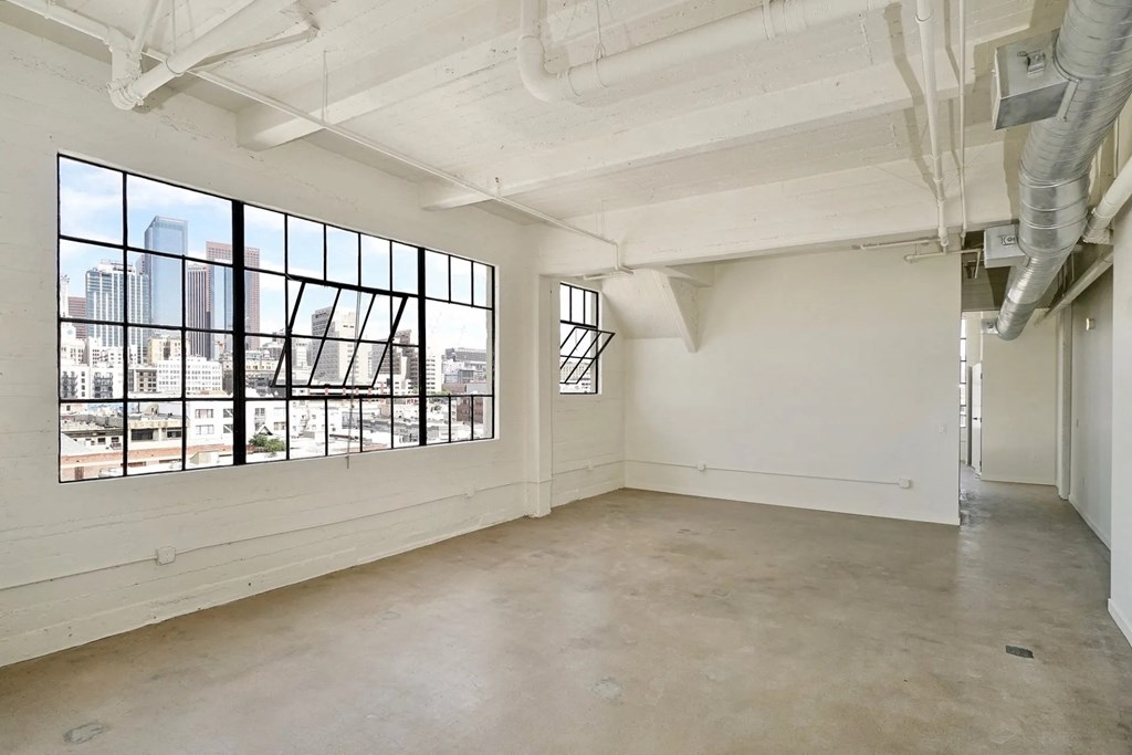 GamerHive Apartments Vacant unit  Living room view with hallway