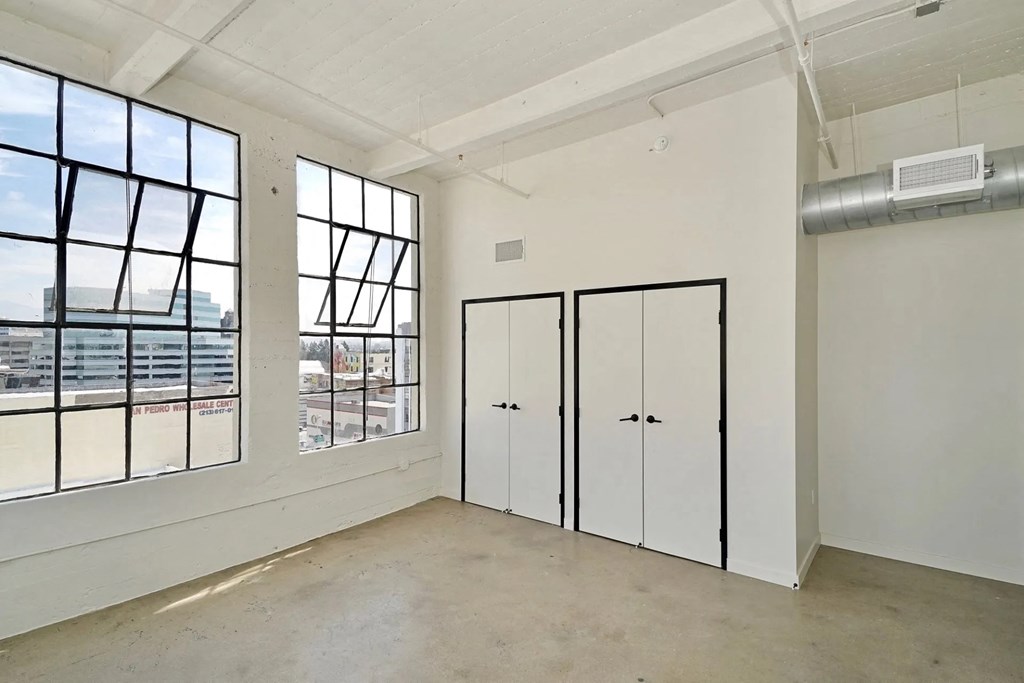 GamerHive Apartments Vacant unit living room view 2