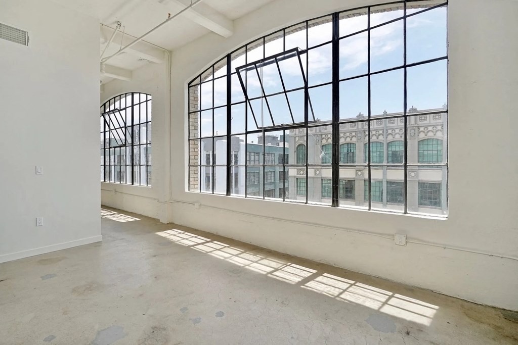 GamerHive Apartments Vacant unit living room