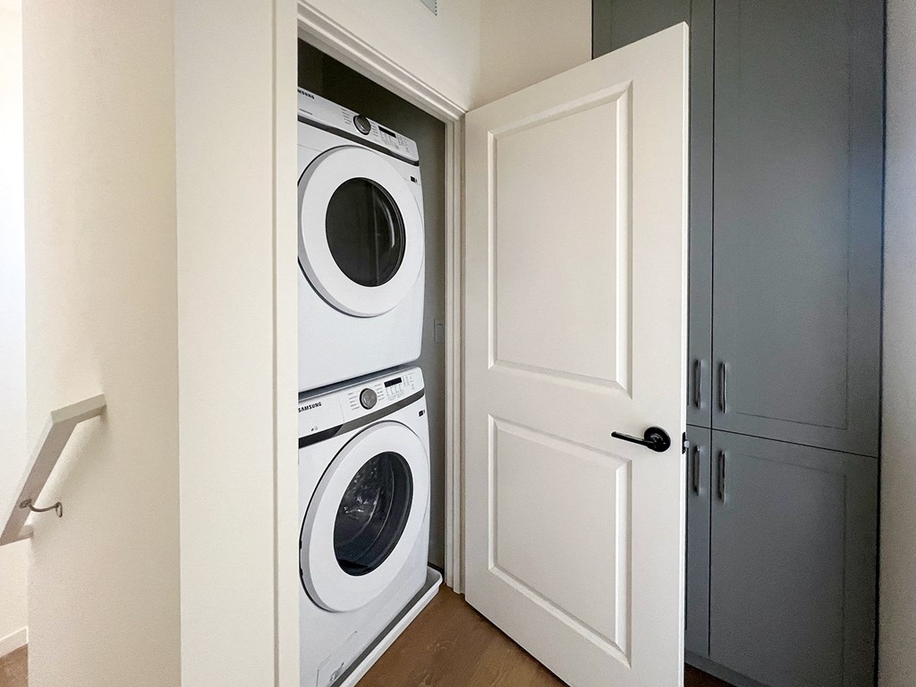 a washer and dryer in a closet in a home at The Willow Townhomes, California, 91762