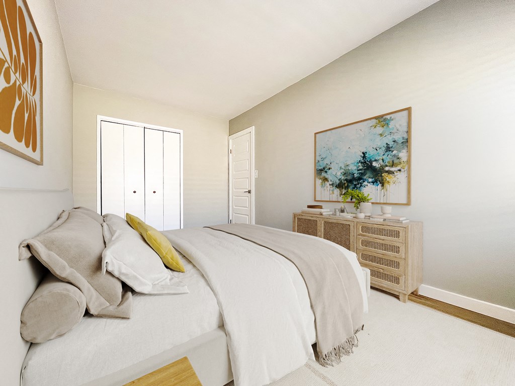 a bedroom with a bed and a dresser