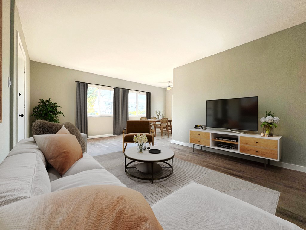 a living room with a couch and a tv