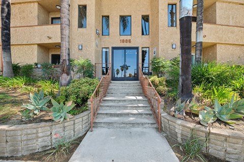 A building with a staircase leading to the entrance.