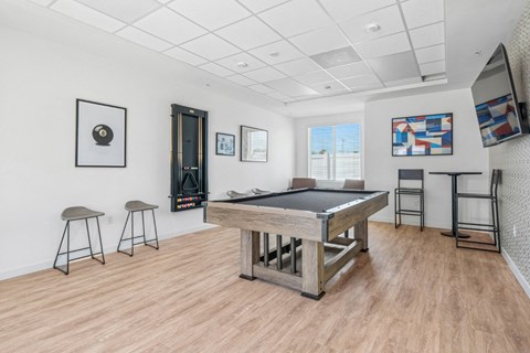 Game room with pool table and dart board at Altitude Apartments, Moreno Valley, 92553