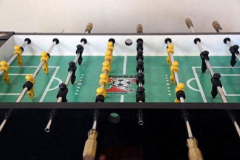 a foosball game table in the onsite game-room - Photo Gallery 13
