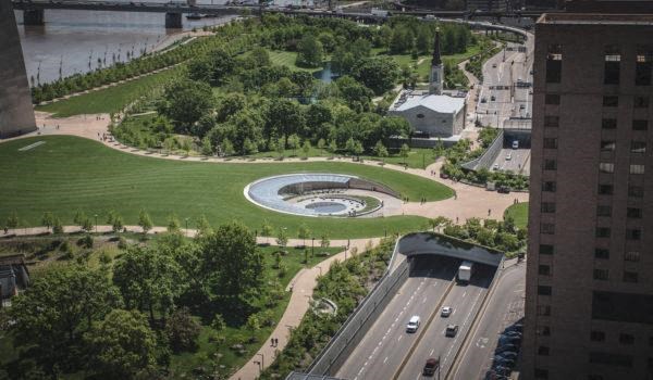 an aerial view of the new Gateway Arch park, museum entrance, freeway and the Basilica of Saint Louis, King of France