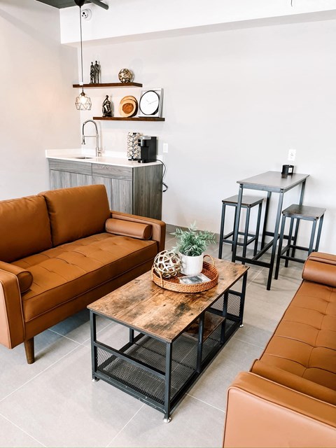 common area with a couch and a table