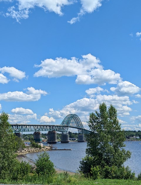 a view of a bridge over a body of water
