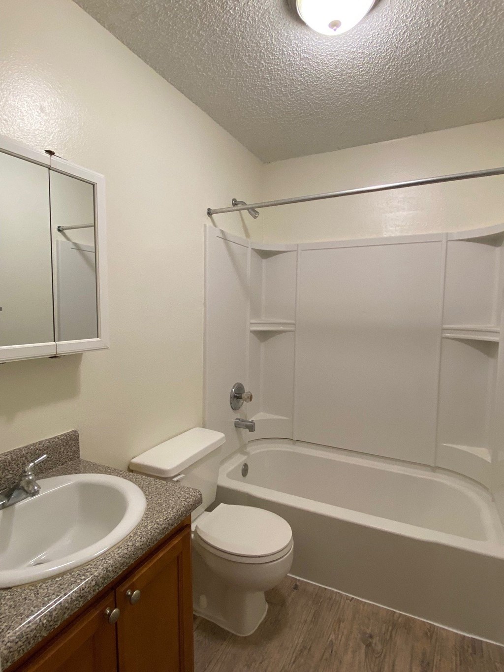 Bathroom with a Sink, Toilet and Bathtub at Pineview Apartments in Clearwater, FL 33755